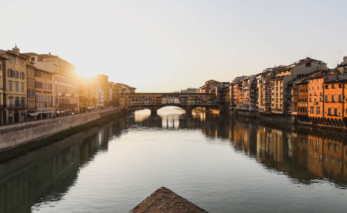 body of water between buildings during daytime