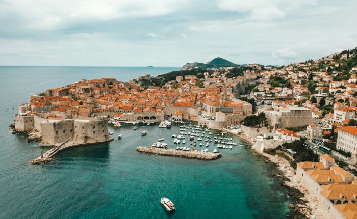 aerial view of buildings near ocean