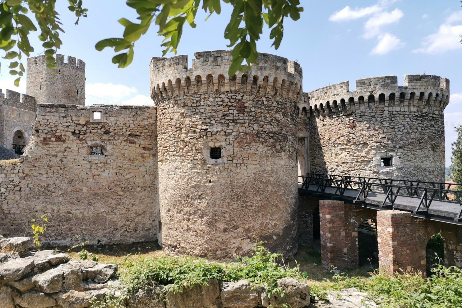 brown concrete castle under blue sky during daytime
